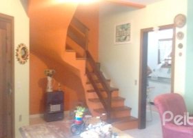 Casa à venda com 124m², 3 dormitórios, 1 suíte, 2 vagas, no bairro Jardim Isabel em Porto Alegre