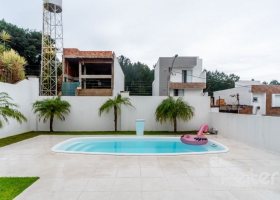 Casa em Condomínio à venda com 250m², 3 dormitórios, 3 suítes, 3 vagas, no bairro Hipica em PORTO ALEGRE