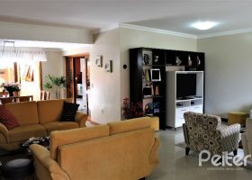 Casa em Condomínio à venda com 286m², 3 dormitórios, 1 suíte, 2 vagas, no bairro Cristal em PORTO ALEGRE