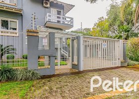 Casa em Condomínio à venda com 286m², 3 dormitórios, 1 suíte, 3 vagas, no bairro Jardim Isabel em Porto Alegre