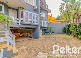 Casa em Condomínio à venda com 286m², 3 dormitórios, 1 suíte, 3 vagas, no bairro Jardim Isabel em Porto Alegre