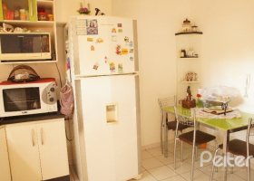 Casa em Condomínio à venda com 148m², 3 dormitórios, 1 suíte, 2 vagas, no bairro Cavalhada em Porto Alegre