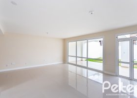 Casa em Condomínio à venda com 190m², 3 dormitórios, 1 suíte, 2 vagas, no bairro Vila Nova em PORTO ALEGRE