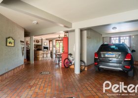 Casa em Condomínio à venda com 459m², 4 dormitórios, 4 suítes, 3 vagas, no bairro Cavalhada em PORTO ALEGRE