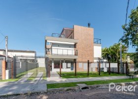 Casa em Condomínio à venda com 306m², 3 dormitórios, 3 suítes, 3 vagas, no bairro Vila Assunção em Porto Alegre