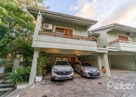 Casa em Condomínio à venda com 170m², 3 dormitórios, 1 suíte, 2 vagas, no bairro Jardim Isabel em Porto Alegre