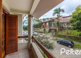Casa à venda com 199m², 3 dormitórios, 1 suíte, 4 vagas, no bairro Jardim Isabel em Porto Alegre