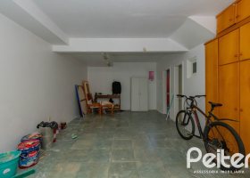 Casa em Condomínio à venda com 252m², 3 dormitórios, 2 suítes, 3 vagas, no bairro Vila Assunção em Porto Alegre