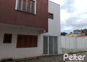 Casa em Condomínio à venda com 117m², 3 dormitórios, 1 suíte, 2 vagas, no bairro Tristeza em Porto Alegre