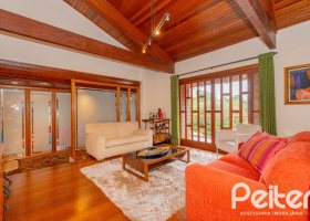 Casa em Condomínio à venda com 420m², 5 dormitórios, 2 suítes, 2 vagas, no bairro Cavalhada em PORTO ALEGRE