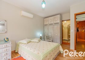 Casa em Condomínio à venda com 420m², 5 dormitórios, 2 suítes, 2 vagas, no bairro Cavalhada em PORTO ALEGRE