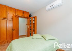 Casa em Condomínio à venda com 420m², 5 dormitórios, 2 suítes, 2 vagas, no bairro Cavalhada em PORTO ALEGRE