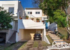 Casa em Condomínio à venda com 161m², 2 dormitórios, 2 suítes, 2 vagas, no bairro Vila Nova em PORTO ALEGRE