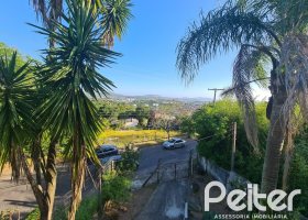 Casa à venda com 510m², 4 dormitórios, 4 vagas, no bairro Vila Nova em Porto Alegre