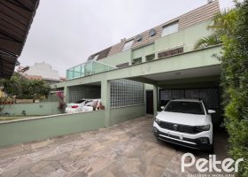 Casa em Condomínio à venda com 209m², 4 dormitórios, 1 suíte, 4 vagas, no bairro Tristeza em Porto Alegre