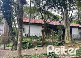 Casa à venda com 397m², 4 dormitórios, 1 suíte, 4 vagas, no bairro Sétimo Céu em Porto Alegre