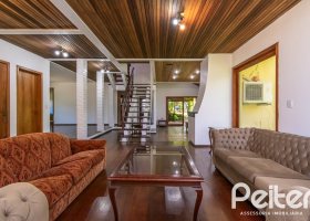 Casa em Condomínio à venda com 350m², 4 dormitórios, 1 suíte, 4 vagas, no bairro Cavalhada em PORTO ALEGRE