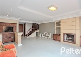 Casa em Condomínio à venda com 249m², 3 dormitórios, 1 suíte, 3 vagas, no bairro Vila Assunção em Porto Alegre