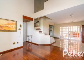Casa em Condomínio à venda com 171m², 3 dormitórios, 1 suíte, 2 vagas, no bairro Tristeza em PORTO ALEGRE