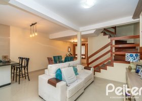 Casa em Condomínio à venda com 133m², 3 dormitórios, 1 suíte, 2 vagas, no bairro Tristeza em Porto Alegre