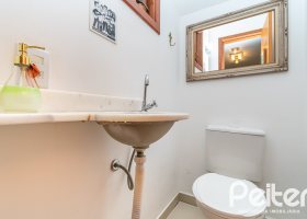 Casa em Condomínio à venda com 133m², 3 dormitórios, 1 suíte, 2 vagas, no bairro Tristeza em Porto Alegre