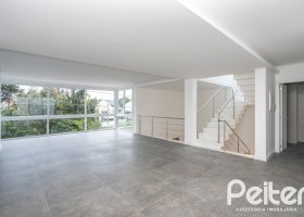 Casa em Condomínio à venda com 256m², 3 dormitórios, 3 suítes, 2 vagas, no bairro Hipica em PORTO ALEGRE