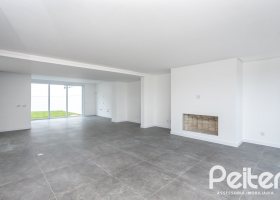 Casa em Condomínio à venda com 256m², 3 dormitórios, 3 suítes, 2 vagas, no bairro Hipica em PORTO ALEGRE