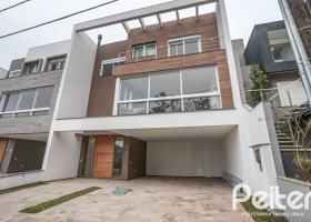 Casa em Condomínio à venda com 256m², 3 dormitórios, 3 suítes, 2 vagas, no bairro Hipica em PORTO ALEGRE