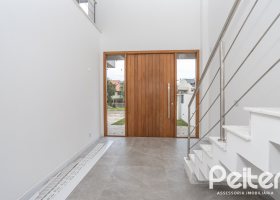 Casa em Condomínio à venda com 254m², 3 dormitórios, 3 suítes, 2 vagas, no bairro Hipica em PORTO ALEGRE