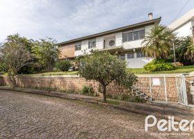 Casa à venda com 395m², 3 dormitórios, 1 suíte, 4 vagas, no bairro Sétimo Céu em Porto Alegre