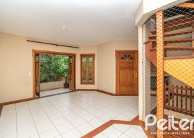 Casa em Condomínio à venda com 279m², 3 dormitórios, 1 suíte, 4 vagas, no bairro Jardim Isabel em Porto Alegre