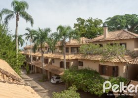 Casa em Condomínio à venda com 295m², 3 dormitórios, 1 suíte, 3 vagas, no bairro Tristeza em PORTO ALEGRE