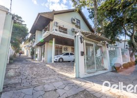 Casa em Condomínio à venda com 225m², 3 dormitórios, 1 suíte, 2 vagas, no bairro Jardim Isabel em Porto Alegre