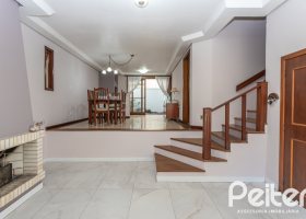 Casa em Condomínio à venda com 225m², 3 dormitórios, 1 suíte, 2 vagas, no bairro Jardim Isabel em Porto Alegre