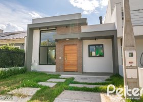 Casa em Condomínio à venda com 93m², 3 dormitórios, 1 suíte, 2 vagas, no bairro Hípica em Porto Alegre