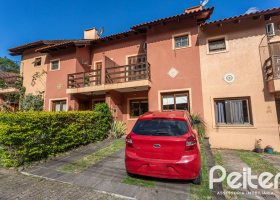 Casa em Condomínio à venda com 147m², 3 dormitórios, 1 suíte, 2 vagas, no bairro Cavalhada em Porto Alegre