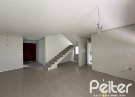 Casa em Condomínio à venda com 266m², 3 dormitórios, 3 suítes, 2 vagas, no bairro Hipica em PORTO ALEGRE