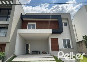 Casa em Condomínio à venda com 266m², 3 dormitórios, 3 suítes, 2 vagas, no bairro Hipica em PORTO ALEGRE
