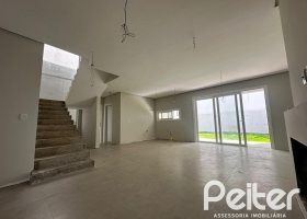 Casa em Condomínio à venda com 266m², 3 dormitórios, 3 suítes, 2 vagas, no bairro Hipica em PORTO ALEGRE