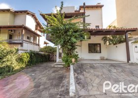 Casa em Condomínio à venda com 195m², 3 dormitórios, 1 suíte, 2 vagas, no bairro Mountain Ville em PORTO ALEGRE