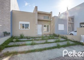 Casa em Condomínio à venda com 88m², 2 dormitórios, 1 suíte, 2 vagas, no bairro Hípica em Porto Alegre