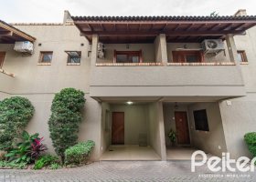 Casa em Condomínio à venda com 102m², 2 dormitórios, 1 suíte, 1 vaga, no bairro Guarujá em Porto Alegre
