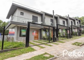 Casa em Condomínio à venda com 96m², 3 dormitórios, 1 suíte, 2 vagas, no bairro Tristeza em Porto Alegre