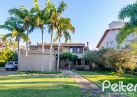 Casa em Condomínio à venda com 315m², 3 dormitórios, 3 suítes, 4 vagas, no bairro Cavalhada em PORTO ALEGRE