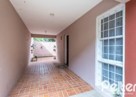 Casa em Condomínio à venda com 133m², 3 dormitórios, 1 suíte, 2 vagas, no bairro Tristeza em Porto Alegre