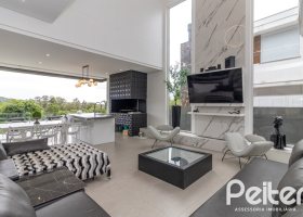 Casa em Condomínio à venda com 309m², 3 dormitórios, 2 suítes, 4 vagas, no bairro Alphaville em PORTO ALEGRE