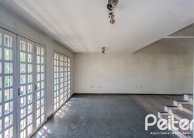 Casa em Condomínio à venda com 201m², 3 dormitórios, 1 suíte, 2 vagas, no bairro Tristeza em PORTO ALEGRE
