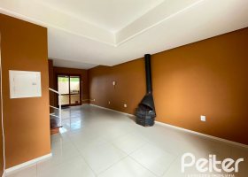 Casa em Condomínio à venda com 97m², 3 dormitórios, 1 suíte, 2 vagas, no bairro Guarujá em Porto Alegre