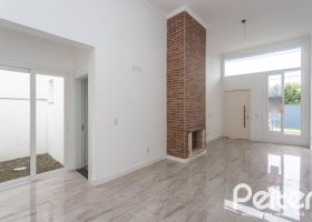 Casa em Condomínio à venda com 90m², 3 dormitórios, 1 suíte, 2 vagas, no bairro Aberta dos Morros em Porto Alegre