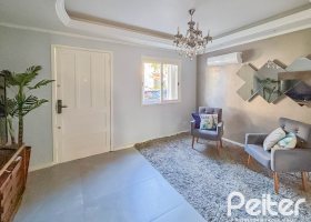 Casa em Condomínio à venda com 117m², 3 dormitórios, 1 suíte, 2 vagas, no bairro Vila Nova em PORTO ALEGRE